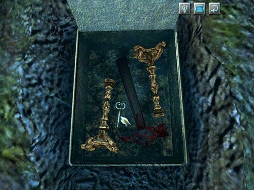 W skrzynce obok skradzionych lichtarzy i zakrwawionego młotka znajdziesz klucz - Odkryj, co bandyci schowali na cmentarzu | Jatka w Whitechapel - Testament Sherlocka Holmesa - poradnik do gry