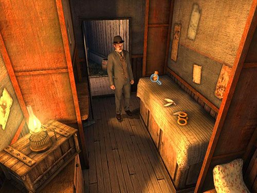 W środku, na niskiej szafce przy drzwiach, stoją rosyjskie matrioszki - Dostań się do warsztatu anarchistów | Finał w opuszczonym lunaparku - Testament Sherlocka Holmesa - poradnik do gry