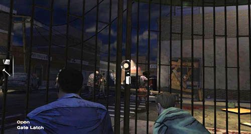 Dlatego użyj topora na kłódce, aby ją odłamać (Lock), przesuń kratę celując w miejsce, w którym przed chwilą była kłódka, (Open: Gate Latch), a potem weź cegłę leżącą tuż przed kratą (Take: Brick) i rzuć nią w szybę sklepu z telewizorami (TV Store) - 6 - Hey, Bud | Epizod I - A New Day | Solucja The Walking Dead - The Walking Dead - poradnik do gry