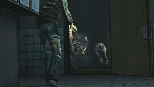Po chwili uwaga skupi się na zombie przedzierających się do środka - 1 - The Morgue | Epizod V - No Time Left | Solucja The Walking Dead - The Walking Dead - poradnik do gry