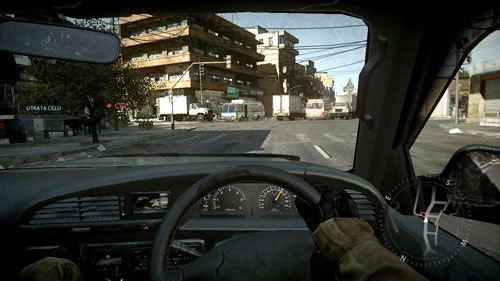 Przejdź przez coś w rodzaju parku z pustą, zakurzoną ziemią, a potem skręć lekko w prawo, aby wjechać na ulicę - 04 - Pościg - Kampania - Medal of Honor: Warfighter - poradnik do gry