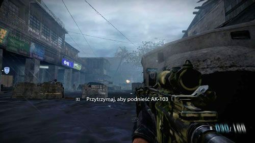Kiedy teren będzie czysty (krzyknie o tym jeden z towarzyszy, a gra dokona autozapisu), ukryj się przy kole białej ciężarówki po prawej (obrazek powyżej) i zacznij wychylać w lewo - 06 - Prąd strugowy - Kampania - Medal of Honor: Warfighter - poradnik do gry