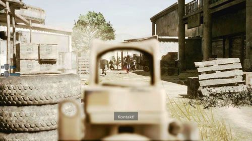 Ukryj się za oponami i otwórz ogień do trzech przeciwników (obrazek powyżej), którzy wybiegną dokładnie na wprost - 08 - W pogoni za Farazem - Kampania - Medal of Honor: Warfighter - poradnik do gry