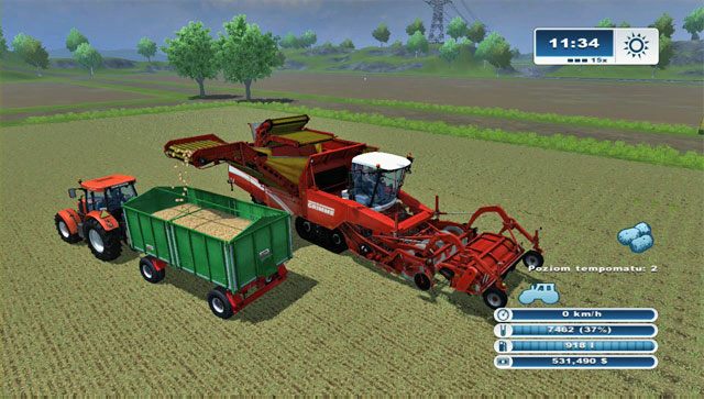 Zrzut ziemniaków z kombajnu odbywa się tak samo jak przy zbożach. - Uprawa ziemniaka | Uprawa ziemi w Farming Simulator 2013 - Farming Simulator 2013 - poradnik do gry