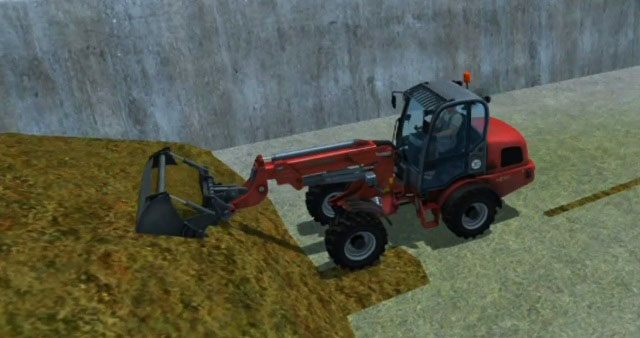 Przenoszenie gotowej kiszonki za pomocą ładowacza czołowego. - Hodowla bydła | Hodowla zwierząt w Farming Simulator 2013 - Farming Simulator 2013 - poradnik do gry