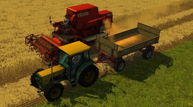 Pracownik kosi zboże, a my w tym czasie odbieramy od niego pszenicę. - Uprawa zboża | Uprawa ziemi w Farming Simulator 2013 - Farming Simulator 2013 - poradnik do gry
