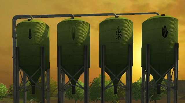 Silosy zbożowe. Od lewej do prawej: pszenica, jęczmień, rzepak i kukurydza. - Lokacje i budynki | Podstawy Farming Simulator 2013 - Farming Simulator 2013 - poradnik do gry