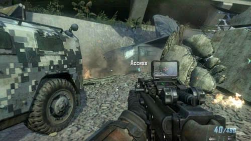 Biegnij do wspomnianego budynku z liczbą 26 i ukryj się z lewej strony drzwi - 11 - Judgment Day | Misje - Opis przejścia | Call of Duty Black Ops II - Call of Duty: Black Ops II - poradnik do gry