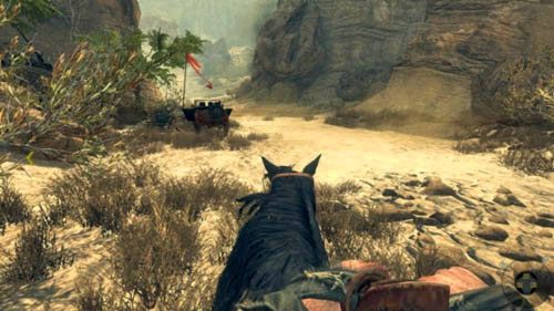 Nie jedź w stronę szarej kropki z napisem Destroy, ale kieruj się trzymając się prawej strony, do tego samego przesmyku, na którego początku zniszczyłeś śmigłowiec pociskiem moździerzowym (wypatruj wraku jeepa po lewej, obok którego stoi czerwona flaga) (obrazek powyżej) - 03 - Old Wounds | Misje - Wyzwania | Call of Duty Black Ops II - Call of Duty: Black Ops II - poradnik do gry