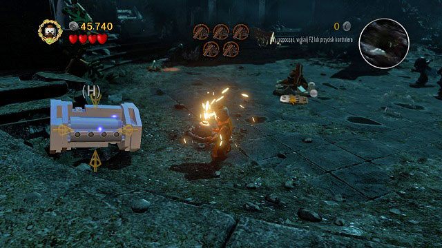 Po lewej stronie areny znajduje się mithrilowa kolumna - Wichrowy Czub | Znajdźki | LEGO The Lord of the Rings - LEGO The Lord of the Rings: Władca Pierścieni - poradnik do gry