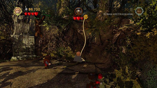 Po prawej stronie areny znajduje się hak, o który trzeba zaczepić linę - Amon Hen (06 - 10) | Znajdźki | LEGO The Lord of the Rings - LEGO The Lord of the Rings: Władca Pierścieni - poradnik do gry