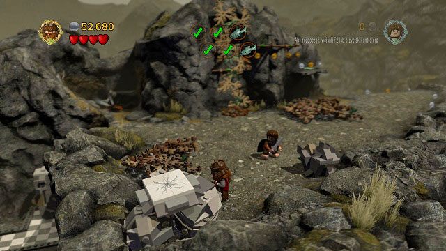 Po przeskoczeni z kolumny na skalną półkę idziemy w kierunku kamery - Obłaskawienie Golluma | Znajdźki | LEGO The Lord of the Rings - LEGO The Lord of the Rings: Władca Pierścieni - poradnik do gry