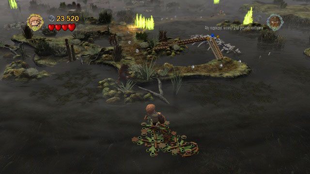 Przy trzeciej ścianie ognia musimy pójść na południe wyspy, w kierunku kamery - Martwe Bagna | Znajdźki | LEGO The Lord of the Rings - LEGO The Lord of the Rings: Władca Pierścieni - poradnik do gry