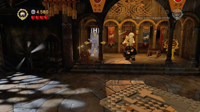 Po lewej stronie tronu znajduje się mithrilowa statua - Atak Wargów | Znajdźki | LEGO The Lord of the Rings - LEGO The Lord of the Rings: Władca Pierścieni - poradnik do gry