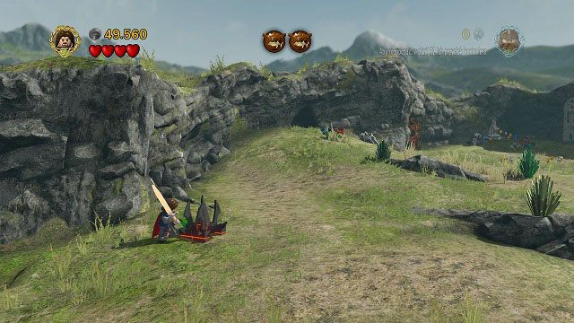 Po lewej stronie pola walki, trochę poniżej minizestawu numer 6 znajduje się klocek LEGO Morgulu - Atak Wargów | Znajdźki | LEGO The Lord of the Rings - LEGO The Lord of the Rings: Władca Pierścieni - poradnik do gry