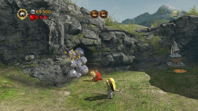 Na lewo od punktu zapisu gry możemy zobaczyć jaskinię zabitą deskami - Atak Wargów | Znajdźki | LEGO The Lord of the Rings - LEGO The Lord of the Rings: Władca Pierścieni - poradnik do gry