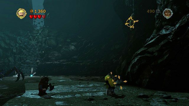 Podczas walki z Szelobą, dookoła areny możemy znaleźć 5 zawieszonych nad naszą głową kokonów - Cirith Ungol | Znajdźki | LEGO The Lord of the Rings - LEGO The Lord of the Rings: Władca Pierścieni - poradnik do gry