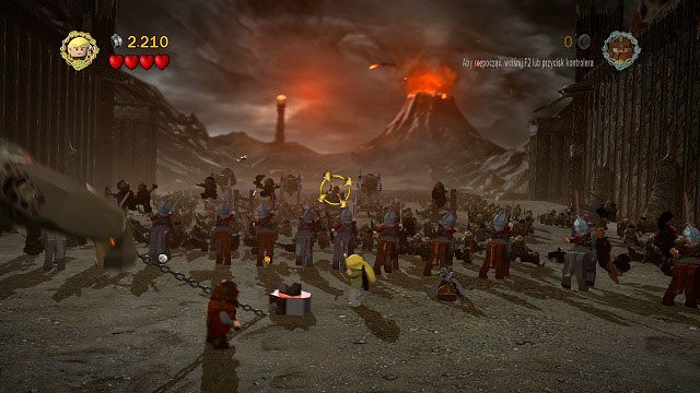 W tle areny zobaczymy 5 wież, na których znajdują się łucznicy orków - musimy trafić je wszystkie, a otrzymamy minizestaw - Czarna Brama | Znajdźki | LEGO The Lord of the Rings - LEGO The Lord of the Rings: Władca Pierścieni - poradnik do gry