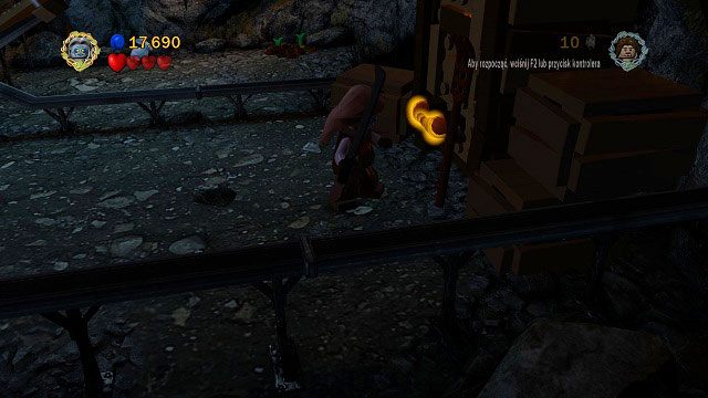 W tej samej lokacji co minizestaw #5; ciągniemy Szagratem za pomarańczową rękojeść i podnosimy skarb - Czarna Brama | Znajdźki | LEGO The Lord of the Rings - LEGO The Lord of the Rings: Władca Pierścieni - poradnik do gry