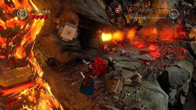 Dalsza droga będzie ponownie polegała na przeskakiwaniu nad lawą oraz wykorzystywaniu poręczy - Prolog | Opis przejścia - Akt I | LEGO The Lord of the Rings - LEGO The Lord of the Rings: Władca Pierścieni - poradnik do gry