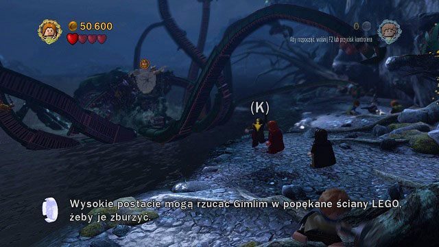 Aby rozprawić się z nim raz na zawsze wystarczy podnieść Gimliego i rzucić nim w popękany klocek - Przełęcz Caradhras | Opis przejścia - Akt I | LEGO The Lord of the Rings - LEGO The Lord of the Rings: Władca Pierścieni - poradnik do gry