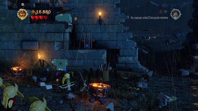 Skorzystajmy z pomocy Gimliego, aby rozbić popękany klocek znajdujący się na ścianie - Helmowy Jar | Opis przejścia - Akt II | LEGO The Lord of the Rings - LEGO The Lord of the Rings: Władca Pierścieni - poradnik do gry