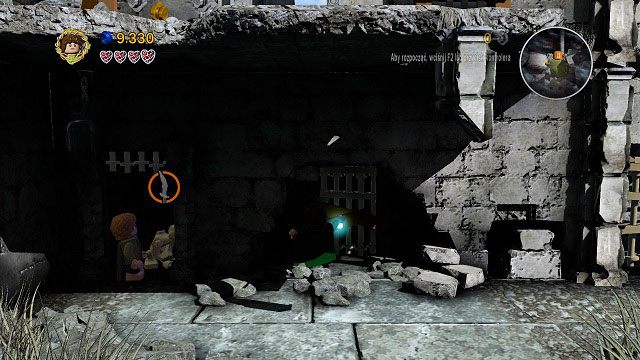 Na wieży pojawił się ork posiadający miecz, którym będziemy mogli uwolnić ręce Golluma - Osgiliath | Opis przejścia - Akt II | LEGO The Lord of the Rings - LEGO The Lord of the Rings: Władca Pierścieni - poradnik do gry