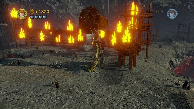 Kierując się dalej w prawo powinniśmy dotrzeć do ściany ognia - Osgiliath | Opis przejścia - Akt II | LEGO The Lord of the Rings - LEGO The Lord of the Rings: Władca Pierścieni - poradnik do gry