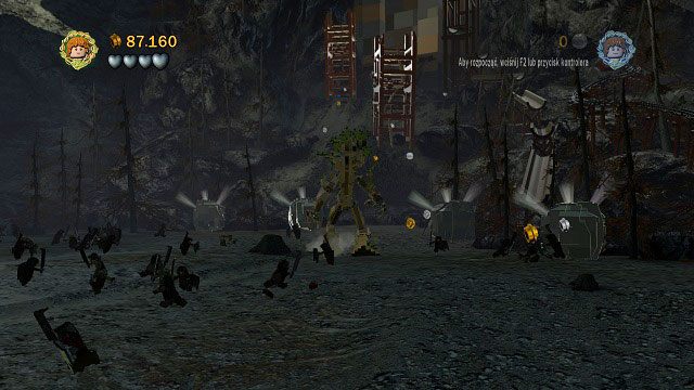 Bezpośrednio przy tamie znajduje się kilka rzuconych na ziemie głazów - Osgiliath | Opis przejścia - Akt II | LEGO The Lord of the Rings - LEGO The Lord of the Rings: Władca Pierścieni - poradnik do gry