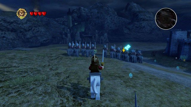 Oko Saurona zwróciło się w kierunku Góry Przeznaczenia blokując dalszą drogę Hobbitom, stąd też będziemy musieli dokonać dywersji, aby pozwolić Frodo i Samowi wykonać powierzone im zadanie - Droga do Minas Tirith (Śródziemie) | Opis przejścia - Akt III - LEGO The Lord of the Rings: Władca Pierścieni - poradnik do gry