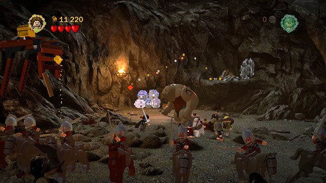 Ponownie udajemy się w lewą stronę od bramy, podążając za szlakiem z monet - Czarna Brama | Opis przejścia - Akt III | LEGO The Lord of the Rings - LEGO The Lord of the Rings: Władca Pierścieni - poradnik do gry