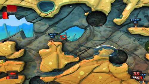 Korzystając z Liny lub Plecaka odrzutowego dostajemy się do przeciwnika usytuowanego najbliżej nas i wybijamy go przy pomocy Kija bejsbolowego w kierunku pozostałych przeciwników [ilustracja] - Bijatyka na plaży | Plaża (Kampania) | Worms Revolution - Worms: Revolution - poradnik do gry