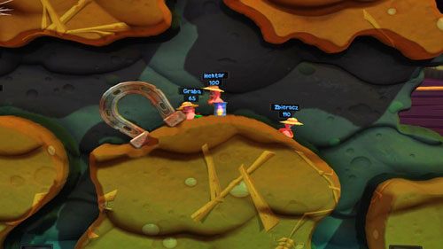 W trakcie czwartej tury ruszamy robalem w okolice szybu, na dnie którego jest trzech robali i podkowa - Kosiarz | Podwórko (Kampania) | Worms Revolution - Worms: Revolution - poradnik do gry