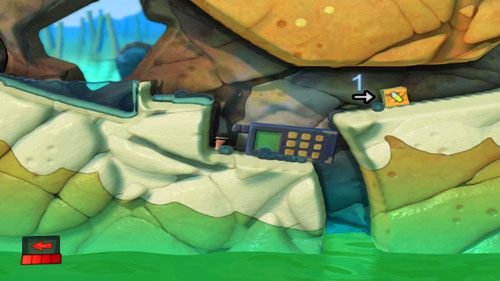 Skacząc obok telefonu (zahaczając antenkę) powinniśmy być w stanie przemieścić go w miejsce zobrazowane powyżej [ilustracja] - Plaża | Łamigłówki | Worms Revolution - Worms: Revolution - poradnik do gry