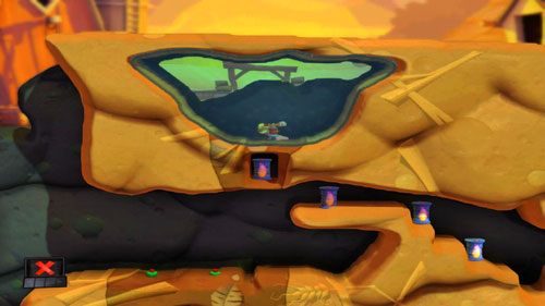 Pierwszym robalem teleportujemy się do wewnątrz zbiornika wodnego - Podwórko | Łamigłówki | Worms Revolution - Worms: Revolution - poradnik do gry