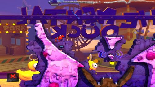 Posiadane dwa Wodne ataki używamy do spłukania przeciwników w dół, gdzie znajdują się beczki z benzyną [ilustracja] - Wszystkie atrakcje wesołego miasteczka! | Łamigłówki | Worms Revolution - Worms: Revolution - poradnik do gry