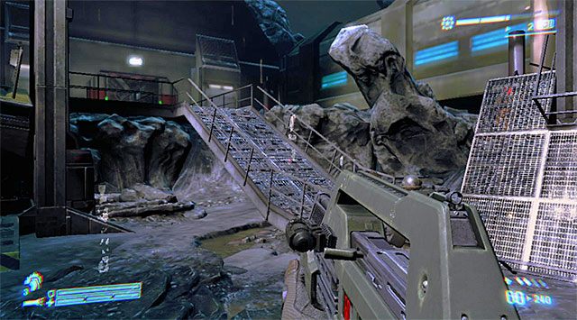 Ruszaj za pozostałymi członkami drużyny, kierując się w stronę pokazanego na powyższym screenie wejścia - Zniszcz działa przeciwlotnicze (3 z 3) | Misja 10 - Wrak odzyskany - Aliens: Colonial Marines - poradnik do gry