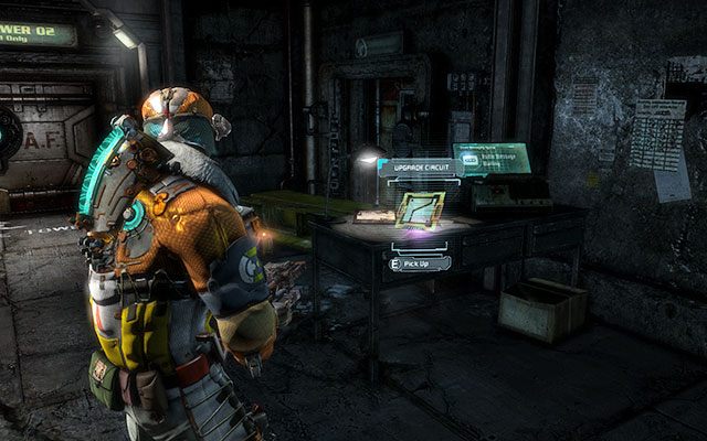 Na stoliku w pomieszczeniu z windą i jednymi zablokowanymi drzwiami otwieranymi na kartę - Rozdział 11 (1) | Sekrety | Dead Space 3 - Dead Space 3 - poradnik do gry