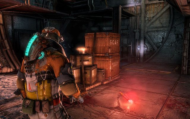 Na skrzynkach, zaraz obok windy towarowej, w miejscu gdzie zdobędziesz klucz dostępu - Rozdział 11 (1) | Sekrety | Dead Space 3 - Dead Space 3 - poradnik do gry