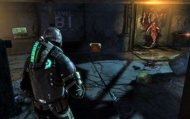 Na biurku po lewej stronie zaraz przy wejściu do pomieszczenia, w którym znajdziesz drugą płytę [sektor biologiczny] - Rozdział 14 (1) | Sekrety | Dead Space 3 - Dead Space 3 - poradnik do gry