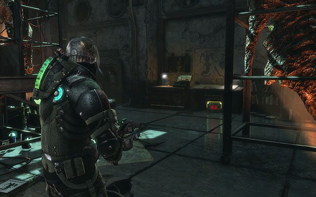 Na stoliku przy ścianie po prawej stronie pomieszczenia, w pomieszczeniu z drugą płytą [sektor paleontologiczny] - Rozdział 14 (1) | Sekrety | Dead Space 3 - Dead Space 3 - poradnik do gry