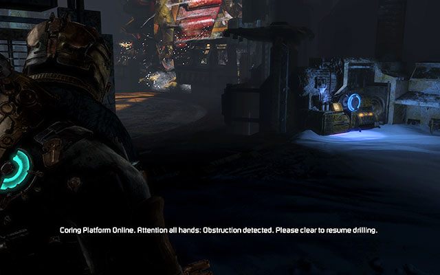 Dostaniesz się do ogromnego pomieszczenia ze sporym wiertłem - 10 - Now We Know - Locate the Experiment Facility | 10, 11 - Now We Know / Signal Hunting - Dead Space 3 - poradnik do gry