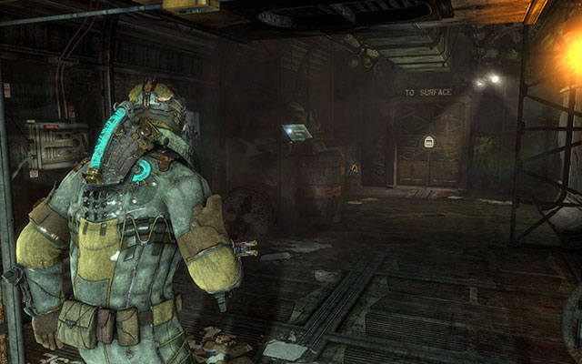 Po zdobyciu nowego kombinezonu i przejściu przez skaner, tuż przy beczkach po lewej stronie - Rozdział 9 | Sekrety | Dead Space 3 - Dead Space 3 - poradnik do gry