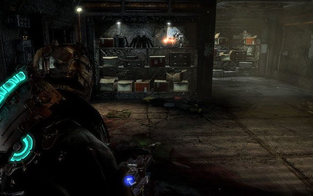 Wewnątrz składu w głównym pomieszczeniu z makietą, który otworzysz przy pomocy klucza dynamometrycznego [torque bar] - Rozdział 10 | Sekrety | Dead Space 3 - Dead Space 3 - poradnik do gry