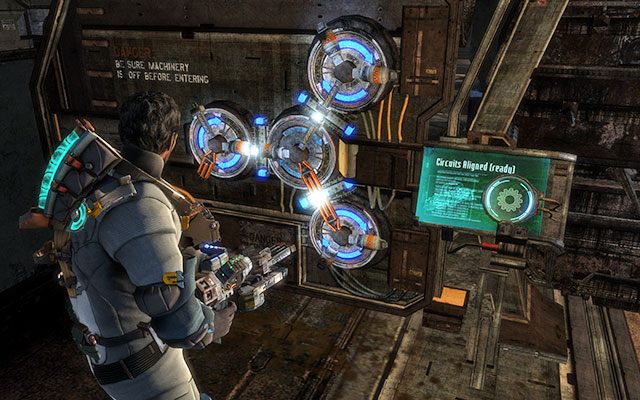 Po przejściu przez następne wrota znajdziesz się w ogromnym pomieszczeniu - Locate a suit kiosk | 8, 9 - Off the Grid / Onward | Dead Space 3 - Dead Space 3 - poradnik do gry
