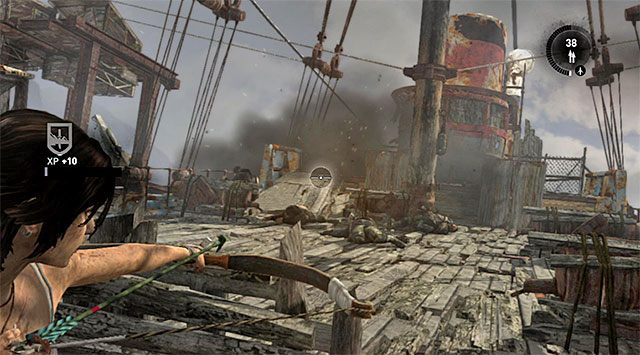 Po wyczerpaniu amunicji do pistoletu maszynowego rozejrzyj się za zapasami, bądź też przełącz się na zwykły pistolet lub łuk - Wybierz się do obozu rozbitków | 20 - Szybka droga na dół | Solucja Tomb Raider - Tomb Raider - poradnik do gry