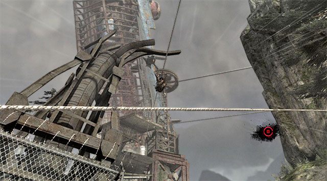 Lara wkrótce przystąpi do zjazdu na linie, który również będzie obfitował w emocje - Wybierz się do obozu rozbitków | 20 - Szybka droga na dół | Solucja Tomb Raider - Tomb Raider - poradnik do gry