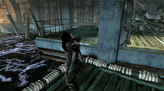 Strzały z liną musisz użyć co najmniej dwa razy, bo dopiero wtedy tratwa podpłynie w to miejsce - Zalany skarbiec | Opcjonalne grobowce - Shipwreck Beach | Solucja Tomb Raider - Tomb Raider - poradnik do gry