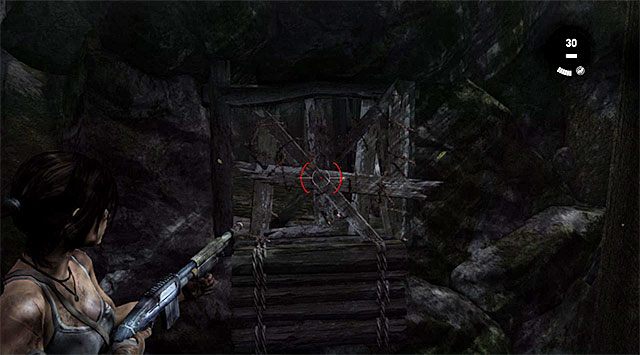 Obróć się w lewo i użyj strzelby do zniszczenia charakterystycznej barykady - Geoskrzynki | Sekrety - Summit Forest (Las na szczycie) | Sekrety Tomb Raider - Tomb Raider - poradnik do gry