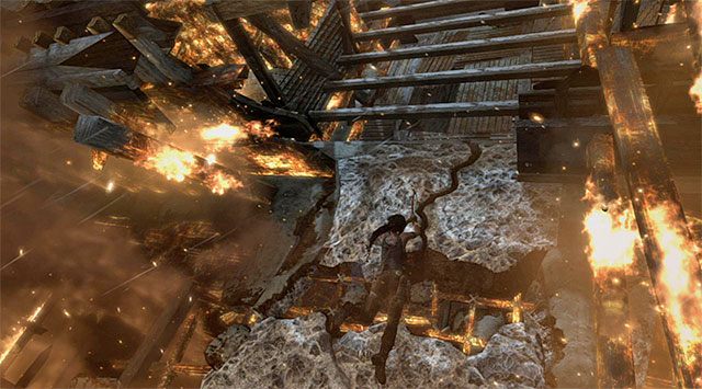 Przemieszczaj się dalej w prawo, docierając do drugiej interaktywnej skały - Przedostań się na szczyt wieży; Doskocz do śmigłowca | 18 - Dotrzyj do śmigłowca - Tomb Raider - poradnik do gry